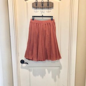 Muted orange/coral mid length skirt